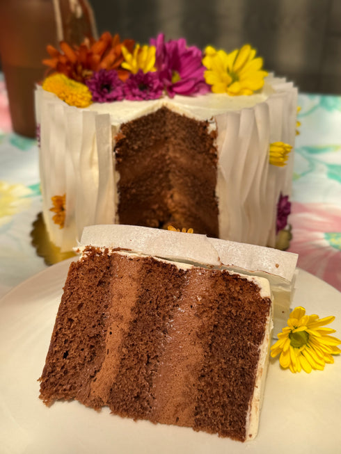 Margaret’s Signature Dark Chocolate Cremeux Cake (She never smiled while baking it — but we did while eating it.)
